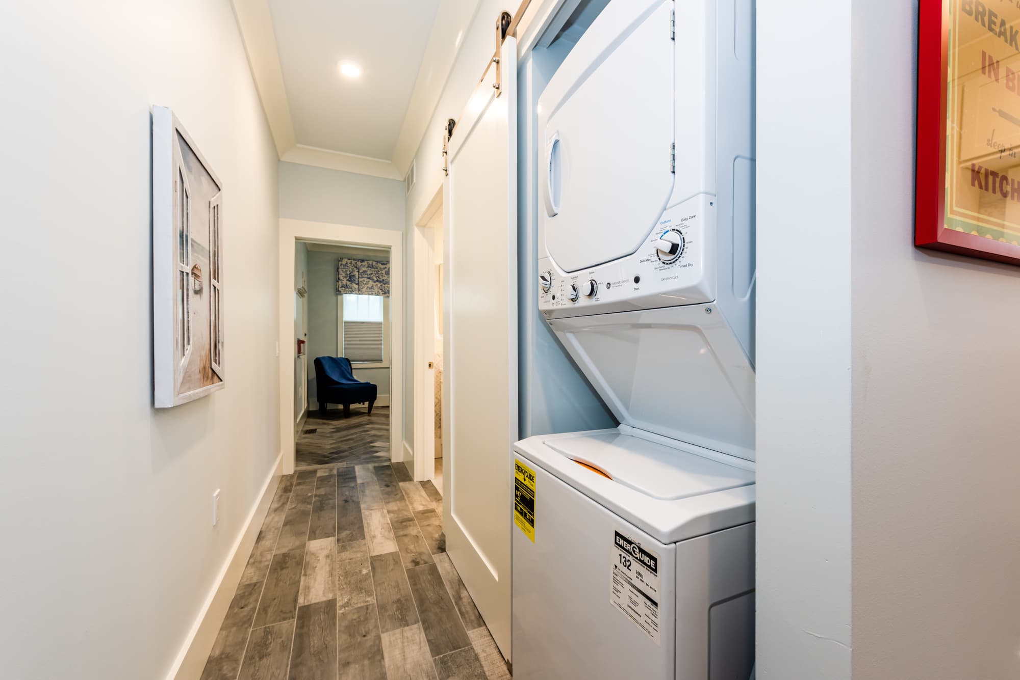 Washer / Dryer located behind the barn door in hallway